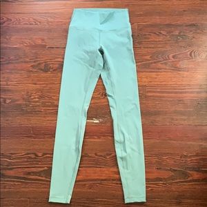 Size 6 Lululemon women’s teal leggings